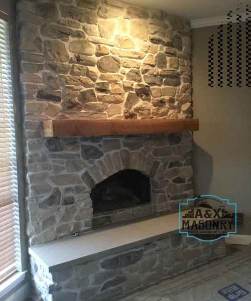 Stone fire place client | Alexander and Xavier Masonry