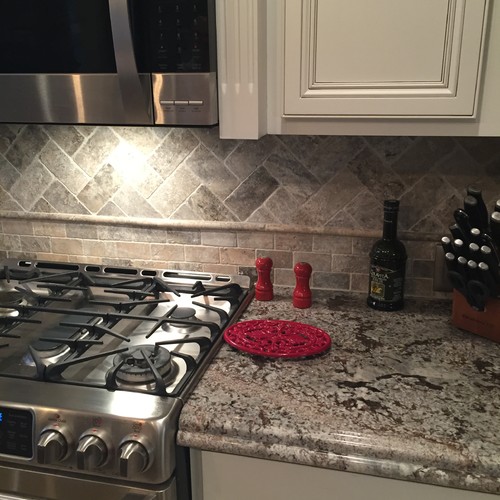 Traditional Kitchen With Dark Granite Countertops - AXMASONRY