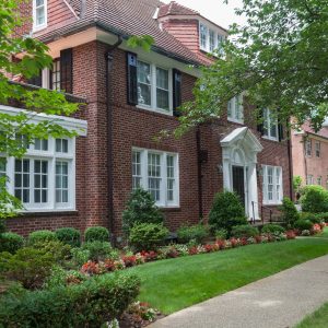 brick arch entrance with white door